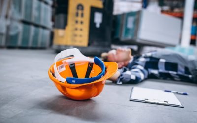 An accident at a warehouse, man on floor